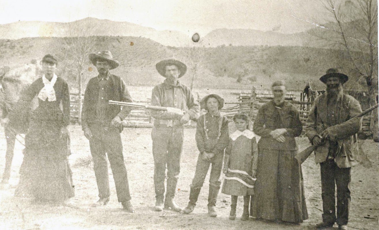 Family photograph supplied by a descendant of Sarah Roberts showing seven people in a valley setting; individual identities and date unconfirmed.