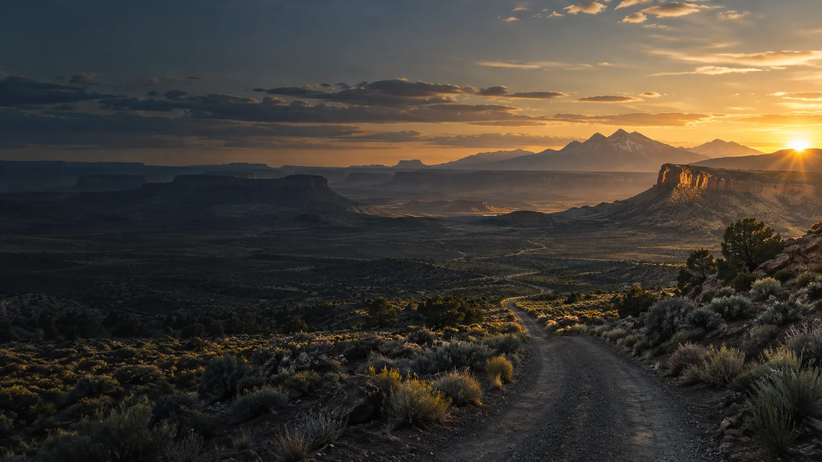 Illustrated high desert road toward a sunlit mesa